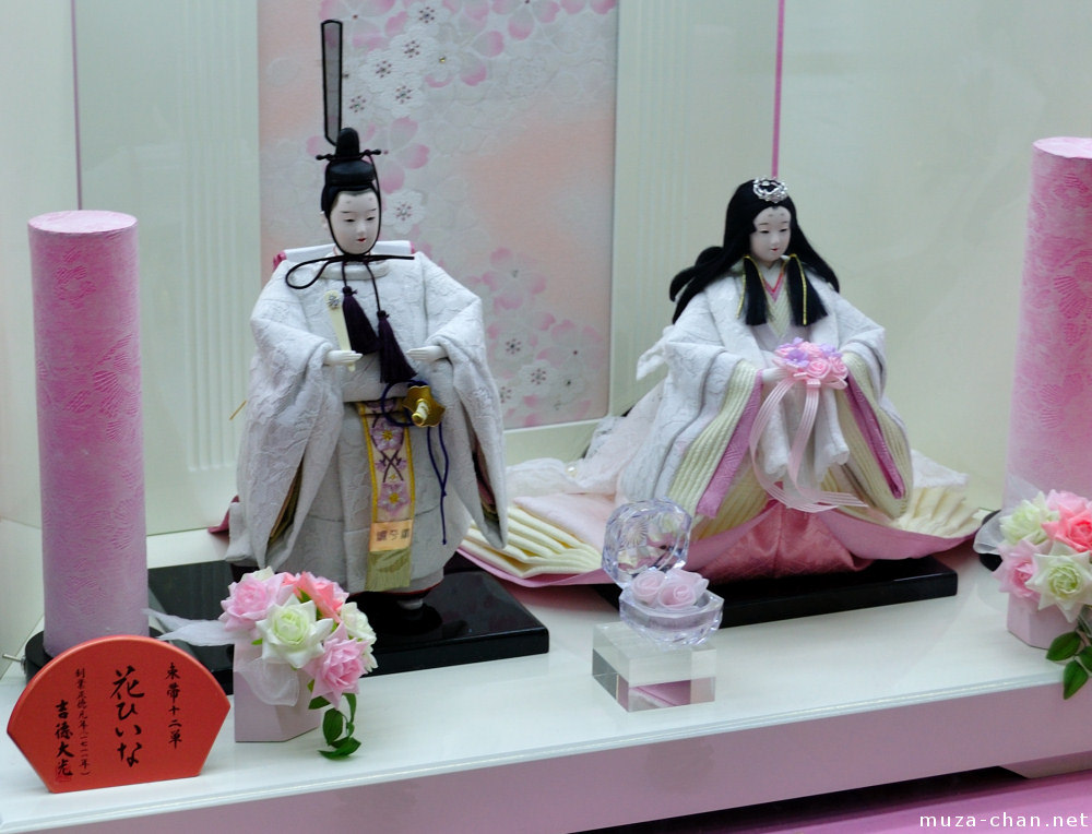 A set of floral-themed modern hina dolls in white,...