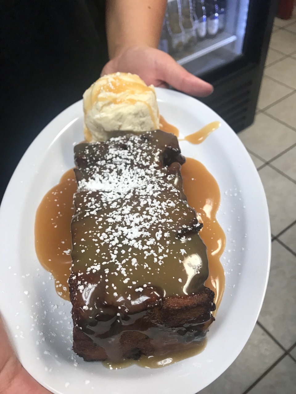 <p>Today is the perfect day to try our deep fried bread pudding smothered in warm caramel sauce and sprinkled with powdered sugar! Don’t forget we put a scoop of vanilla bean ice cream on the side as well! Yummy!!!</p>