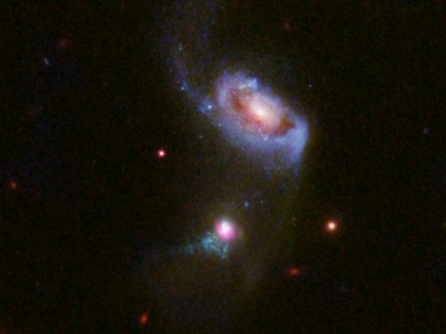 Hubble views a supermassive black hole burping \u2014...