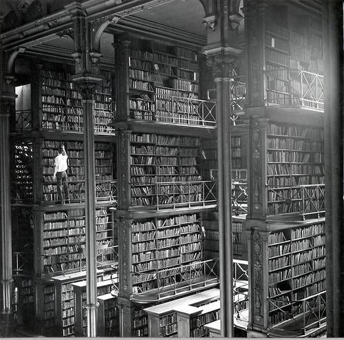 historicaltimes:A man browsing for books in Cincinnati’s...