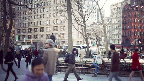 Busy day in Manhattan… but there’s always time for the paper.