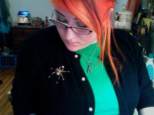 sometimes i think i am kind of attractive Spider pin orange hair girl in glasses cardigan sweater yep