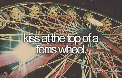 Kiss at top of a ferris wheel