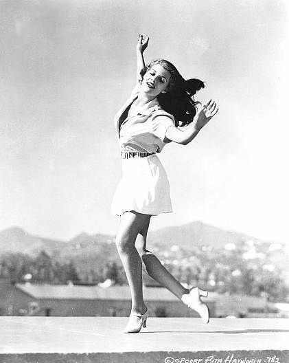 For Lovely Rita (Rita Hayworth tap dancing while she is being...)