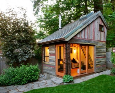 Rustic Backyard Micro-House is Built from Recycled Barnboard<br />There’s somethin’ about tiny houses that I just love.<br />(Click picture for article)<br />This place looks awesome.