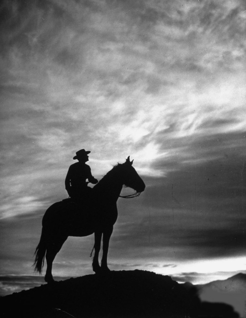 firsttimeuser:Silhouette of cowboy mounted on horse, 1949 by...