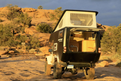 architizer:<br /><br />The Jeep ActionCamper replaces the iconic Jeep “roll cage” with a lightweight, fiberglass mobile camper, equipped with bed, kitchen and storage.<br />