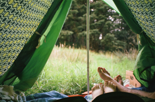 camping New Zealand North Island lovers feet tent hippy relaxing