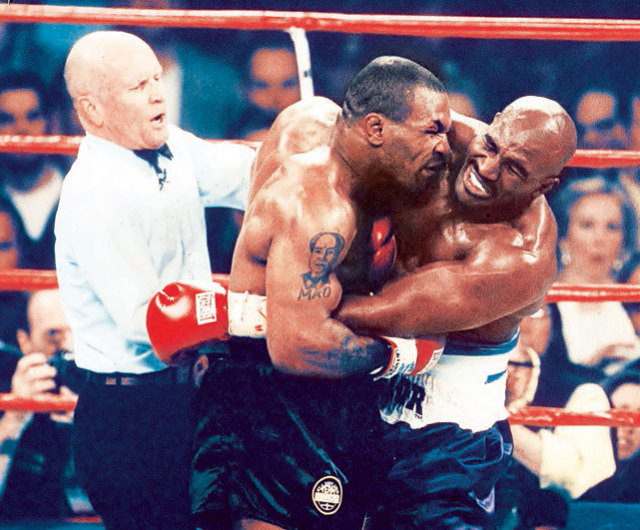 Fifteen years ago today, Mike Tyson famously... - SI Photo Blog