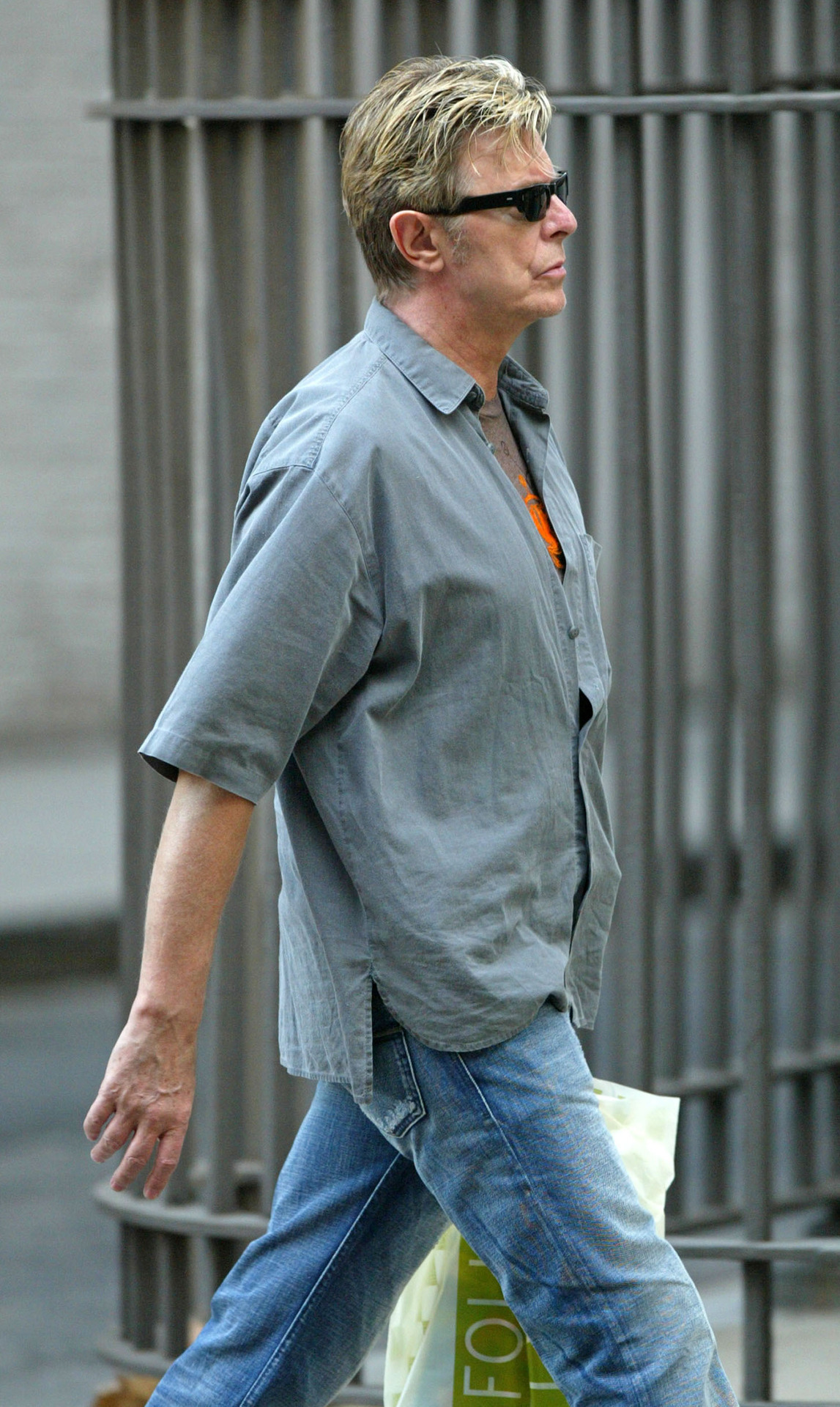 The World Loves A Clown | David Bowie walking in New York, October 5, 2005