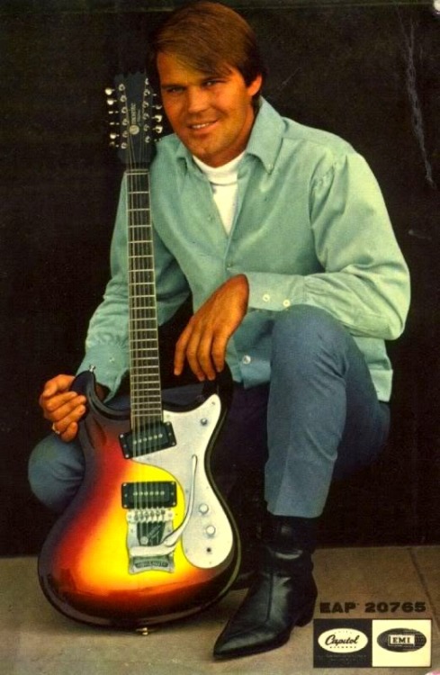 Glen Campbell with a 12-string Mosrite and Beatle boots. Among...