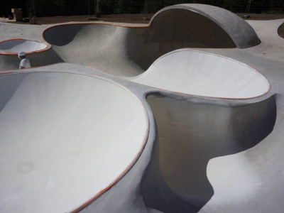 shinyslingback:<br /><br />glow-in-the-dark skatepark<br />koo jeong-A has designed a concrete sculpture which features a composition of different bowls connected by three different tunnels. located on vassivière island in france, ‘otro’ stands as a fully functioning skatepark, but this one’s a little bit different - it’s glow-in-the-dark eliminating the complications of an evening skate session. drawn to the surrounding mysterious wooded french landscape, the korean artist wanted to create a dreamscape amidst the natural surroundings. the artwork is something that is meant to live and be used providing a sensorial experience to skaters and spectators alike.<br />http://www.designboom.com/weblog/cat/8/view/22814/glow-in-the-dark-skatepark.html<br />