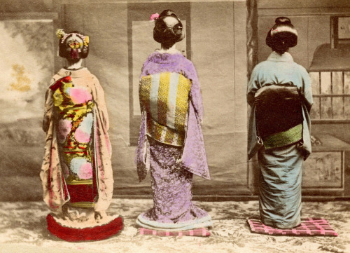 Dressed for Shubun-no-hi (1890)
“From left to right, a Maiko (Apprentice Geisha), a Junior Geiko (Geisha), and a Geiko (Geisha), dressed in fine clothing, probably to celebrate Shubun-no-hi (Autumn Equinox) given the Autumn motifs on the Maiko’s obi...