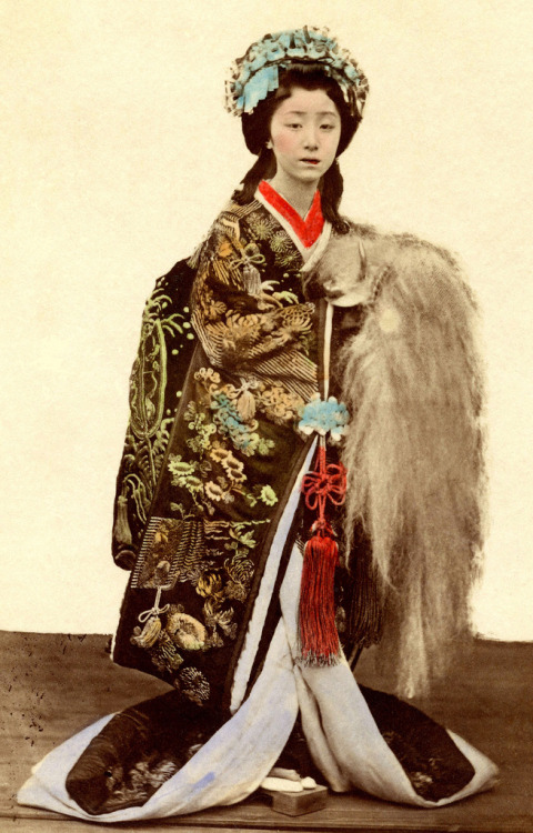 A Geiko dressed as Princess Yaegaki (1880)
“In the Kabuki dance “Kitsune-bi” (Fox-fires), Princess Yaegaki saves her lover by following magical fox-fires across a frozen lake to deliver a treasured battle helmet. Here she holds the fantastic horned...