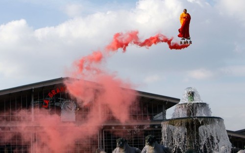 gkojax:Chinese artist Li Wei performs in the sky over the...
