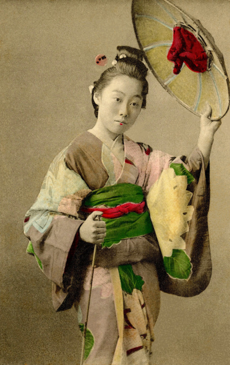 Genroku Style Travelling Clothes 1907 (by Blue Ruin1)
“ A Tokyo Geisha wearing a Tsubo-shozoku (travelling outfit) consisting of a Kosode (short-sleeved kimono) decorated with large patterns of the “Hitta-kanoko-shibori” variety, typical of the...