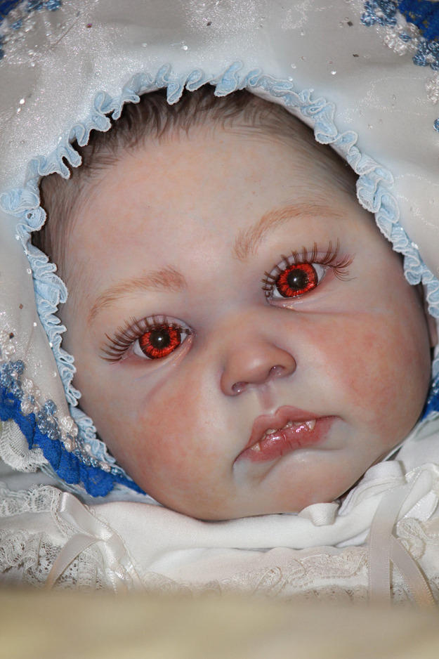 vampire baby doll with eyes that follow you